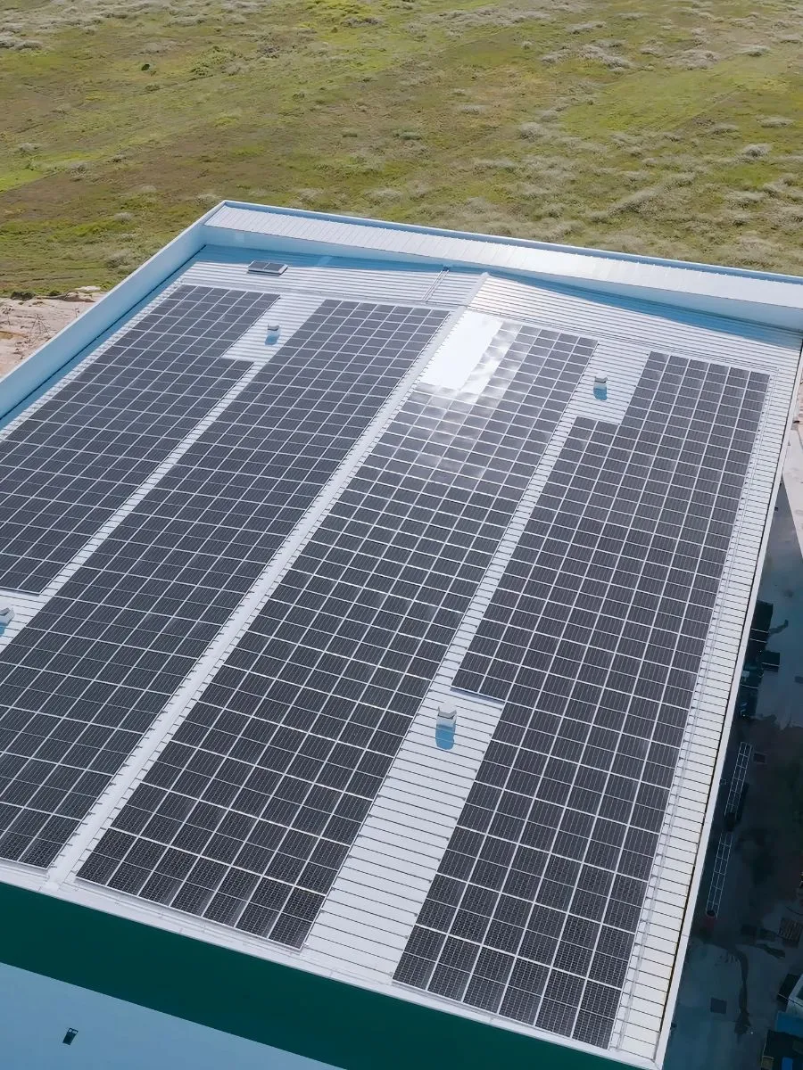 Large-scale commercial solar panel array on an industrial rooftop in Los Angeles by NeighborSun.